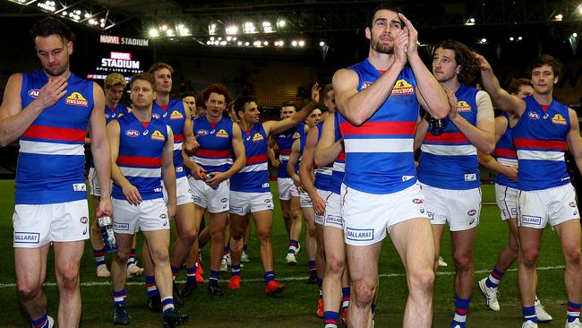 The victorious Bulldogs leave the arena to the cheers of fans. Picture: Getty Images