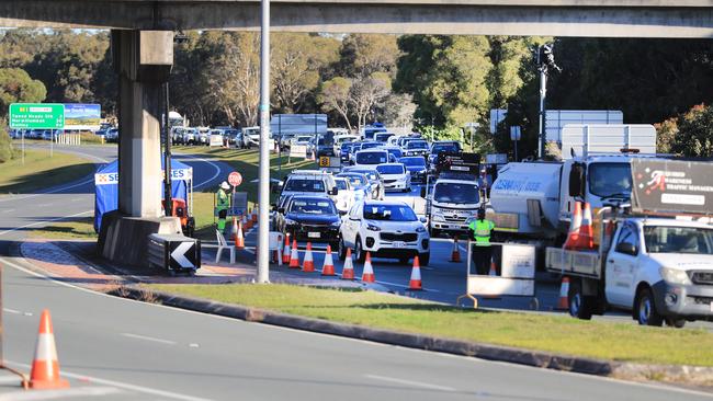 Entry permits are checked at Tugun Picture: Scott Powick