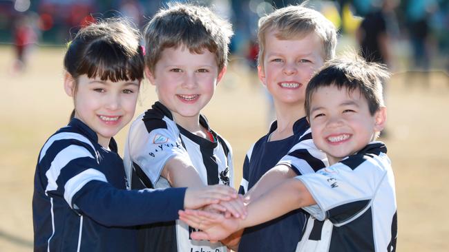 West Ryde Rovers and Gladesville Ravens players Erin Brick, Xavi Trajcevski, Alexander Tinsley and Isaac Chong. Gladesville Hornsby Football Association and North West Sydney Womens Football have agreed to merge into North West Sydney Football. Pictures: Angelo Velardo