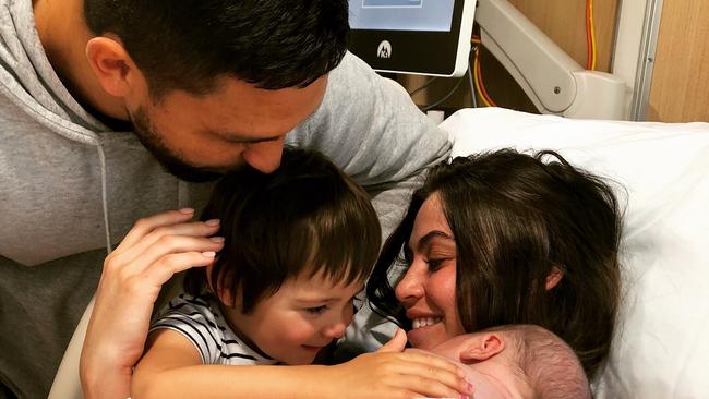 Waratahs back Curtis Rona and wife Jacinta with newborn son Ezekiel and daughter Sapphire.