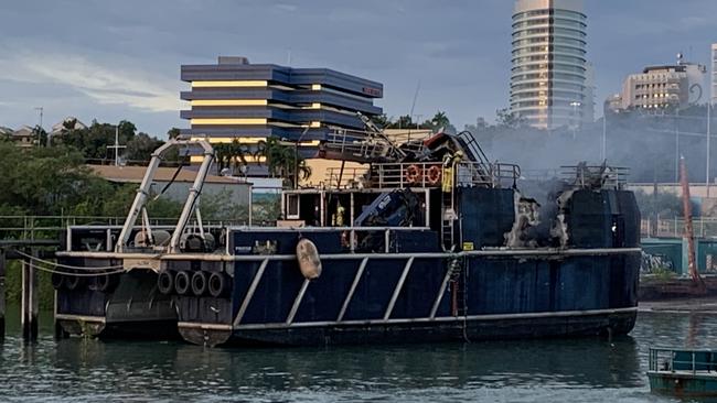 The 24m MV Guru went up in flames in a fire at Hornibrook’s Wharf in Frances Bay Wednesday morning, which sent choking plumes of smoke across the Darwin CBD. Picture: NT News