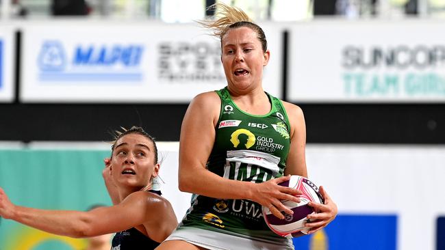 BRISBANE, AUSTRALIA - SEPTEMBER 05: Jess Anstiss of the Fever catches the ball during the round ten Super Netball match between the Melbourne Vixens and the West Coast Fever at Nissan Arena on September 05, 2020 in Brisbane, Australia. (Photo by Bradley Kanaris/Getty Images)