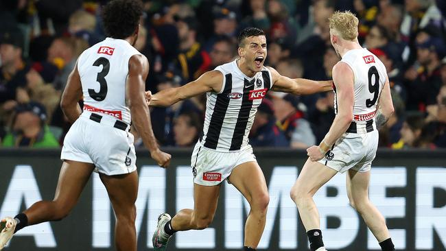 First step for Collingwood is getting their defensive band back together including sending Nick Daicos back to join Isaac Quaynor (3) and John Noble (9). Picture: Sarah Reed/AFL Photos via Getty Images