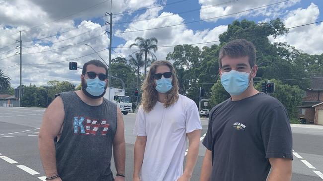 Manos Pitsikoulis, Michael Welsh and George Pitsikoulis at Northern Beaches Hospital's testing clinic. Picture: Madelaine Wong