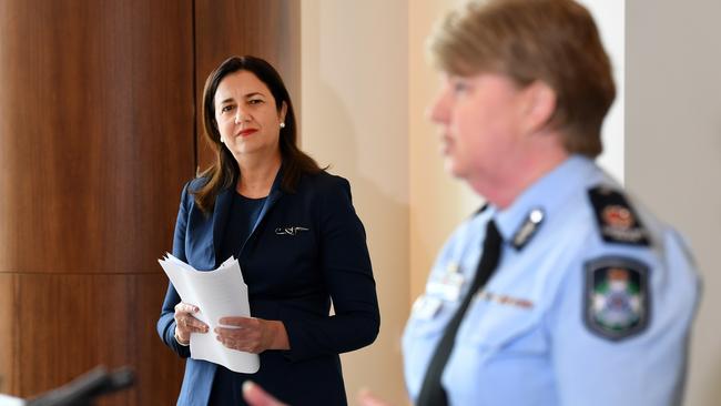 Queensland Premier Annastacia Palaszczuk watches Assistant Commissioner Cheryl Scanlon as she speaks during a press conference in Brisbane. Picture: Dan Peled