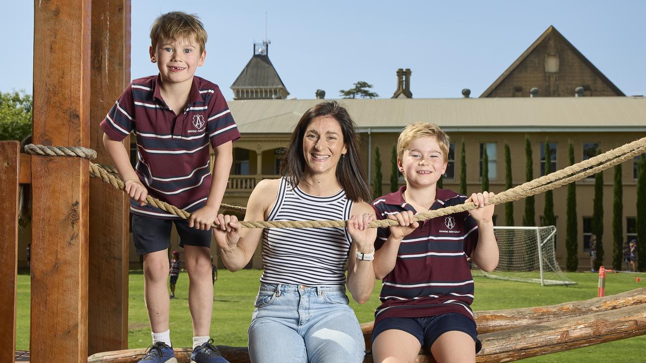 Annesley Junior School students Eddie and Henry Bannister, aged 7 and 9, with mum Lizzie Bermingham at the Wayville campus. Picture: Matt Loxton