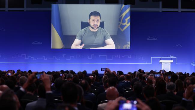 Ukraine President Volodymyr Zelensky delivers a speech via videolink on the first day of the Ukraine Recovery Conference in London.