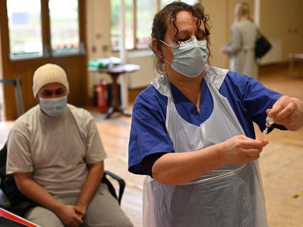 A British doctor prepares to administer a dose of the AstraZeneca/Oxford COVID-19 vaccine in Nottingham, central England. Picture: AFP