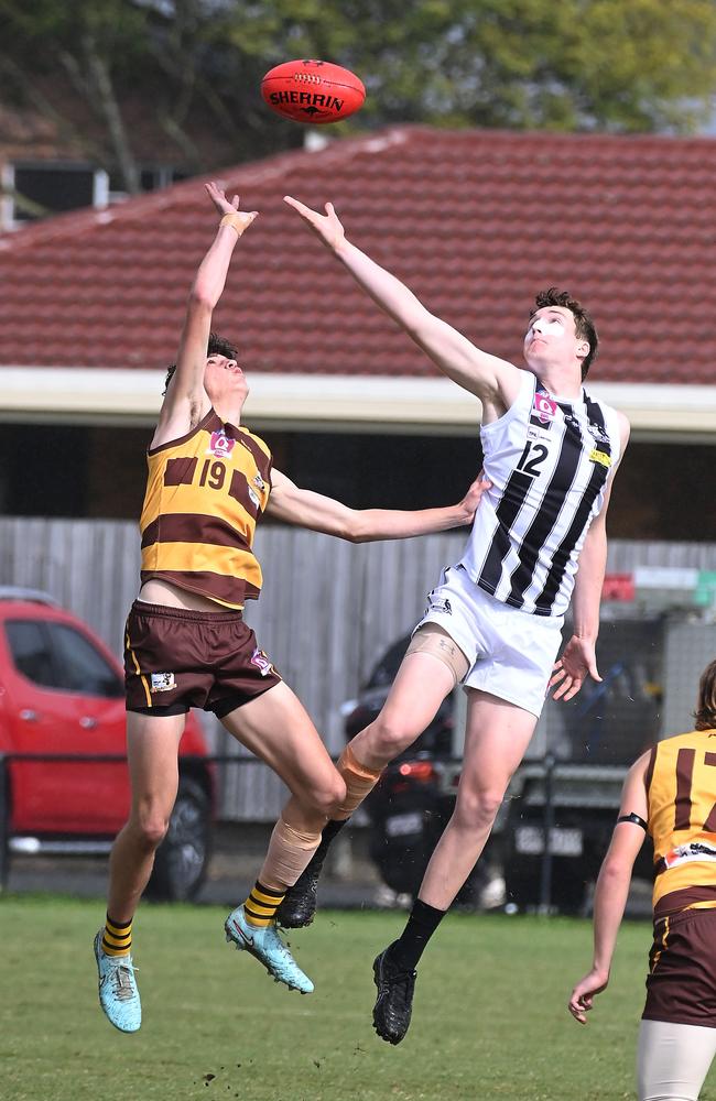 Sherwood’s Maxwell Boothey, right and Aspley’s Duncan Lewis, left in the ruck last Saturday.Picture, John Gass