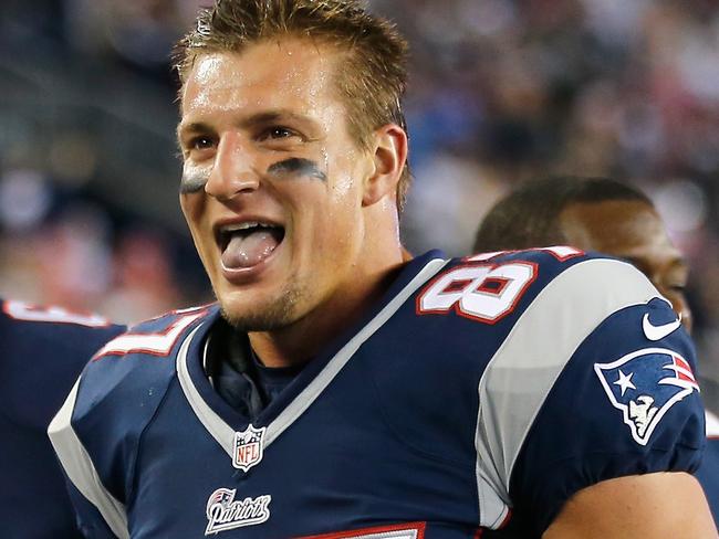 FOXBORO, MA - OCTOBER 05: Rob Gronkowski #87 of the New England Patriots reacts after scoring a touchdown during the third quarter against the Cincinatti Bengals at Gillette Stadium on October 5, 2014 in Foxboro, Massachusetts. Jim Rogash/Getty Images/AFP == FOR NEWSPAPERS, INTERNET, TELCOS & TELEVISION USE ONLY ==