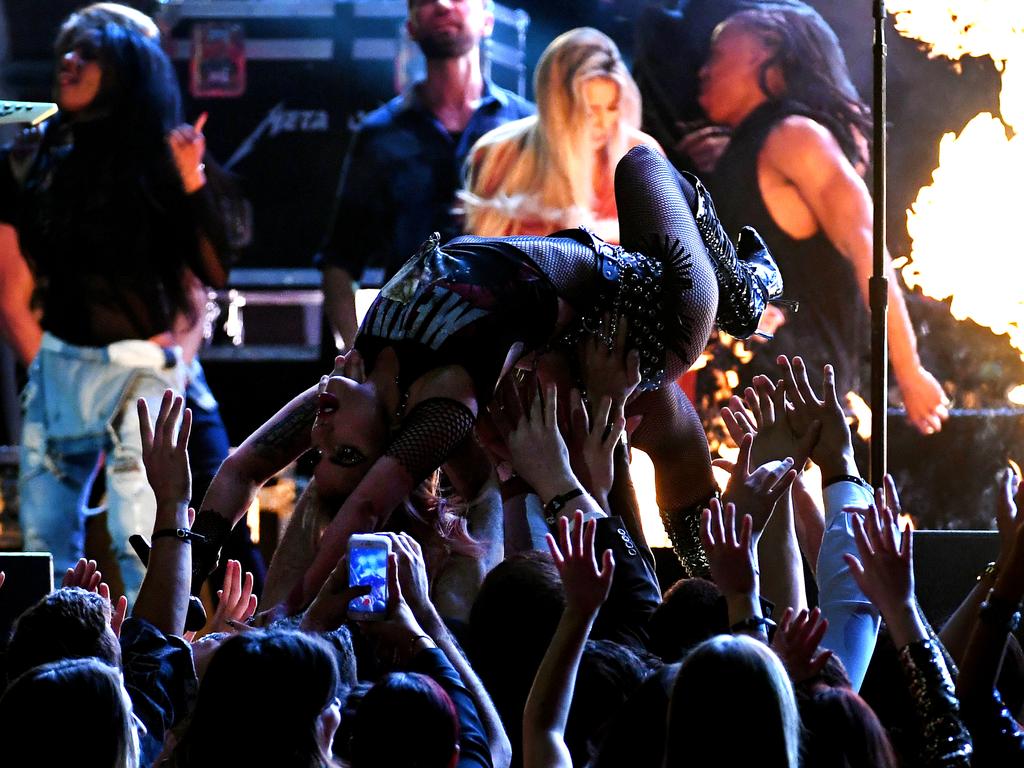 Lady Gaga crowd surfs during The 59th GRAMMY Awards at STAPLES Center on Fe...