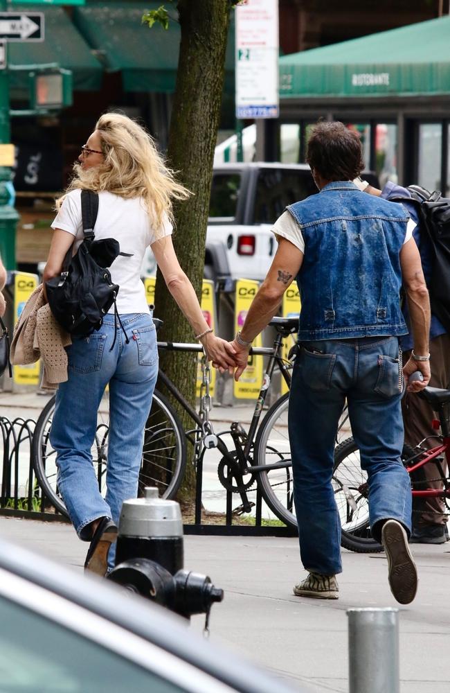 The new couple were seen briefly holding hands and sharing a kiss as they walked around NYC. Picture: BrosNYC / BACKGRID