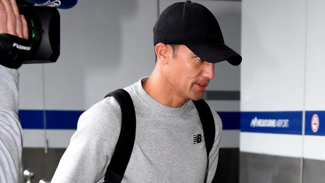 Tim Cahill arrives at Melbourne airport for his flight to Honduras. Picture: Nicole Garmston
