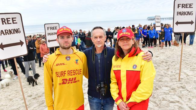 Joey Loielo, artist Andrew Baines and Beck Forest at Henley Beach. Residents and business owners are protesting about the paid parking and supporting the council recommendation to rip up the meters. Picture: AAP Image/ Keryn Stevens