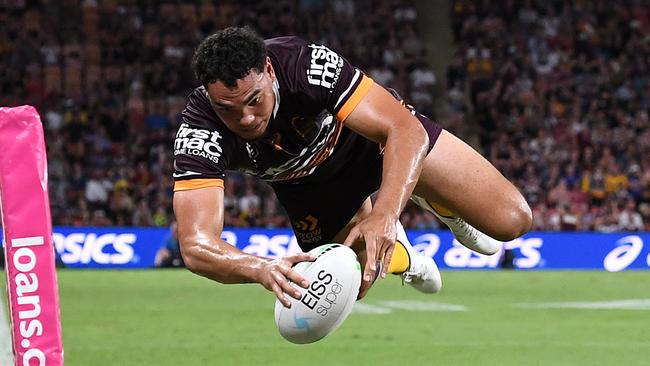 BRISBANE, AUSTRALIA - MARCH 12: Xavier Coates of the Broncos scores a try during the round one NRL match between the Brisbane Broncos and the Parramatta Eels at Suncorp Stadium, on March 12, 2021, in Brisbane, Australia. (Photo by Bradley Kanaris/Getty Images)