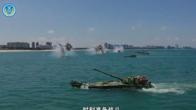 The Chinese military released a video warning ahead of Nancy Pelosi’s visit of a full-scale amphibious assault showing its army, navy and air force in a simulated invasion of Taiwan.