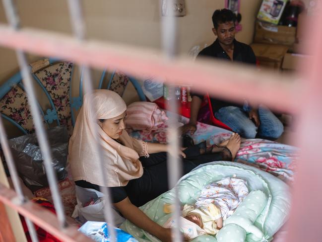 Rashid Mohammed and Taslemah Mohammed with their new born baby boy Rohan Mohammed in Cambodia. The family is being supported by South Australians who fear for their safety and wellbeing. Rashid is the last asylum seeker left in the 2015 Cambodia deal by Australian government to settle refugees banned from Australian shores from Nauru. He says he is yet to gain residency in Cambodia, can not find work and has been abandoned by both governments.  , , Photo Credit: Piseth Nhem,