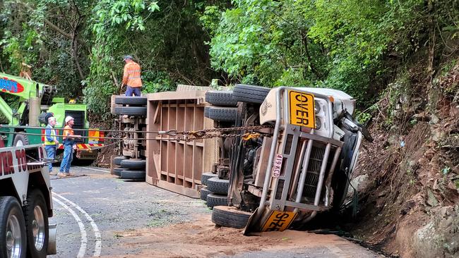 Scene of a truck rollover on the Kuranda Range Road in February attended by Queensland Police forensics officers and Queensland Fire and Emergency Services. The road was closed to all traffic for around seven hours. Picture: Brendan Radke