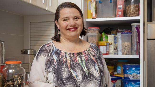 FOR HIBERNATION -  The Joyful Frugalista Serina Bird with her pantry at home in Canberra. Picture by Sean Davey