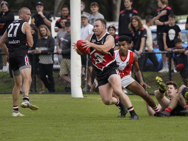 David Armitage snaps a goal for Bonbeach while Sam Gilbert (left) looks on. Picture: Valeriu Campan