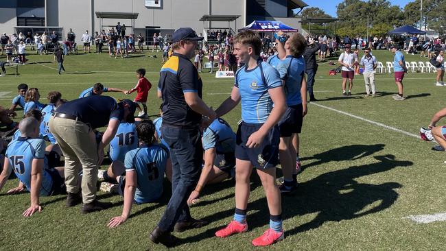 St Columban's coach Jack Lane and Charley Ogden celebrate a tight win over Ormiston, sealed by a nailbiting Ogden conversion.