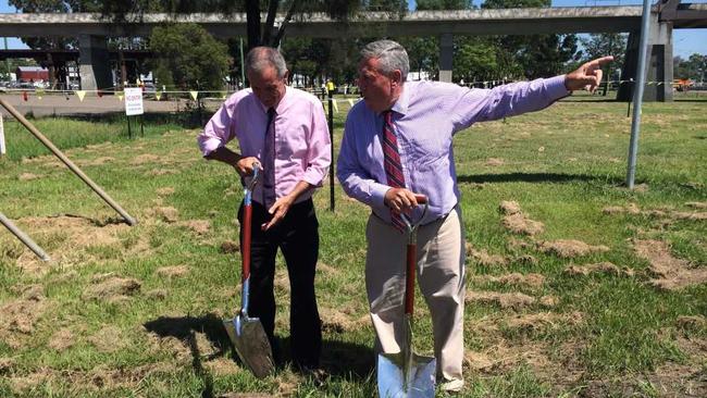 Member for Clarence Chris Gulaptis and Minister for the North Coast and Roads and Freight Duncan Gay turn the first sod for the new Grafton Bridge. Photo: matthew Elkerton