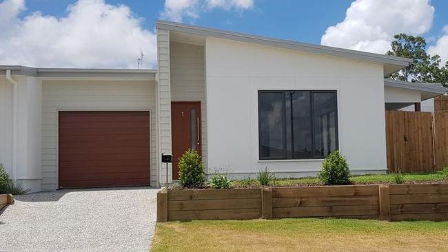 The Xenia St property in Pimpama, where three families and removalist trucks rocked up on the weekend, only to find out they had been scammed. Picture: Wings Real Estate Helensvale