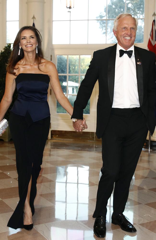 Golfer Greg Norman, right, and wife Kirsten Kutner arrive for a State Dinner. Picture: AP