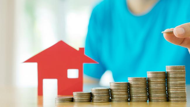 Coins with a picture of a house. Picture: Thinkstock