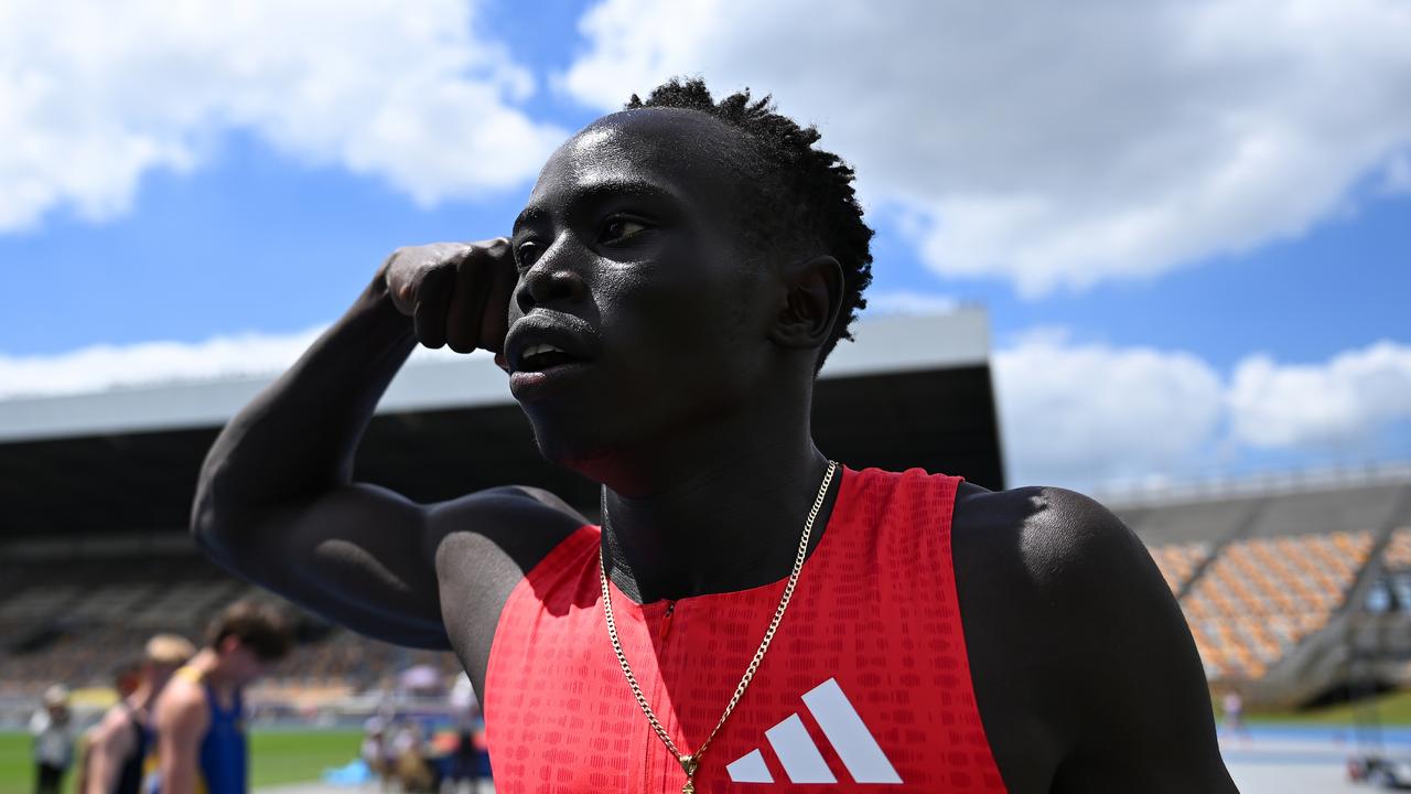 Gout Gout celebrates qualifying in first place in the Men 200m Under 20 Prelims. (Photo by Albert Perez/Getty Images)