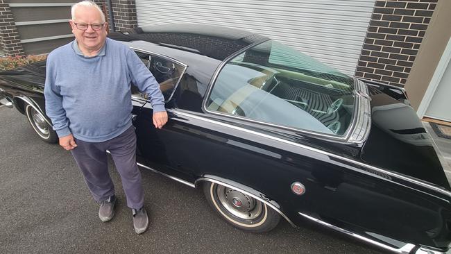 Des Cooper with his restored 1965 Plymouth Barracuda.