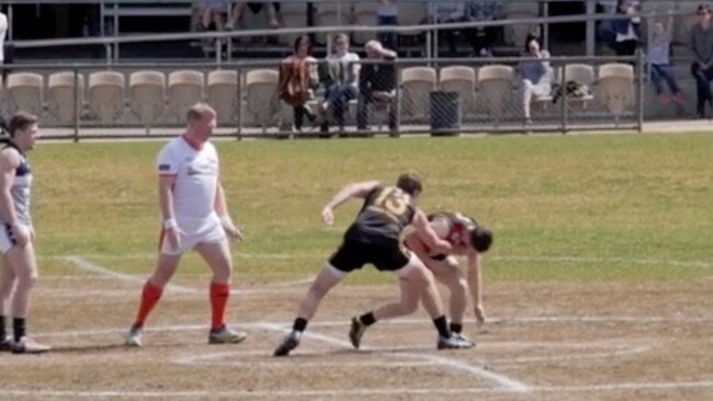 Kennedy stumbling after trying to get up from a tackle while playing for Goodwood. The tackler did not receive a suspension.