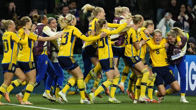 Giant killers Sweden celebrate victory after knocking out reigning Champions USA. Picture: Jose Breton/Nur via Getty Images