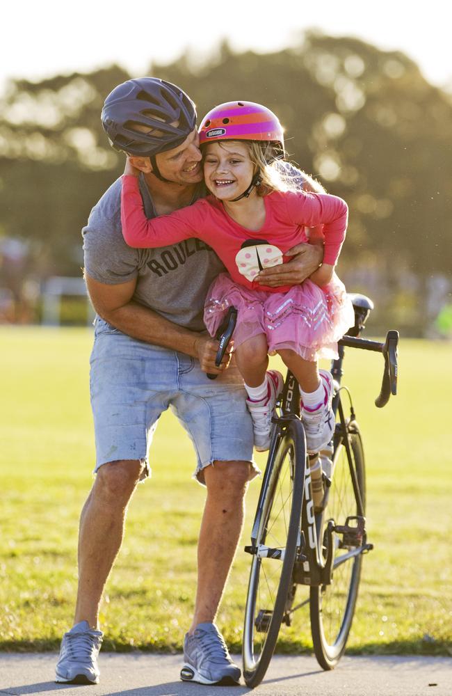 Robbie Allan with his daughter at Heffron Park. Picture: Jenny Evans