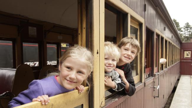 Pictured (L-R) are siblings Andrea, Cameron and Luke Marshall in 2010, waiting for the steam engine to pull the train from Clarence Station. Zig Zag Railway ran steam trains and rail motors between 1975 and 2012. Picture: John Fotiadis