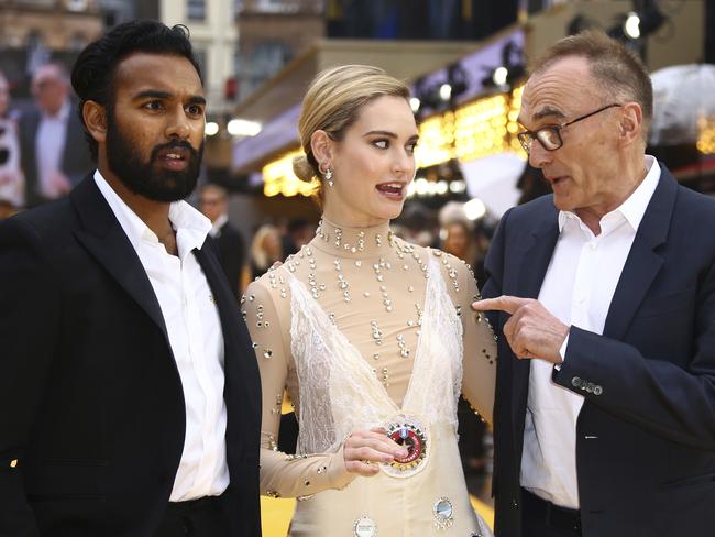 Patel and James with director Danny Boyle. Picture: Joel C Ryan/Invision/AP