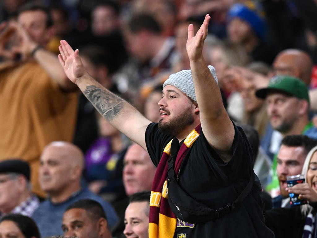 A Brisbane fans protests a call by referee Sutton. (Photo by Bradley Kanaris/Getty Images)