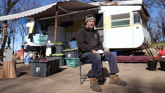 Jim Neil from Cobargo is living in a donated caravan that leaks after losing his home in the New Year's bushfires. Picture: Jonathan Ng