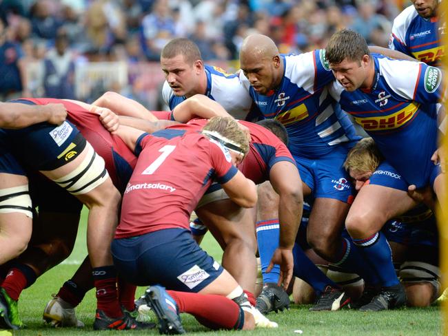 Reds and Stormers prepare to pack down a scrum.