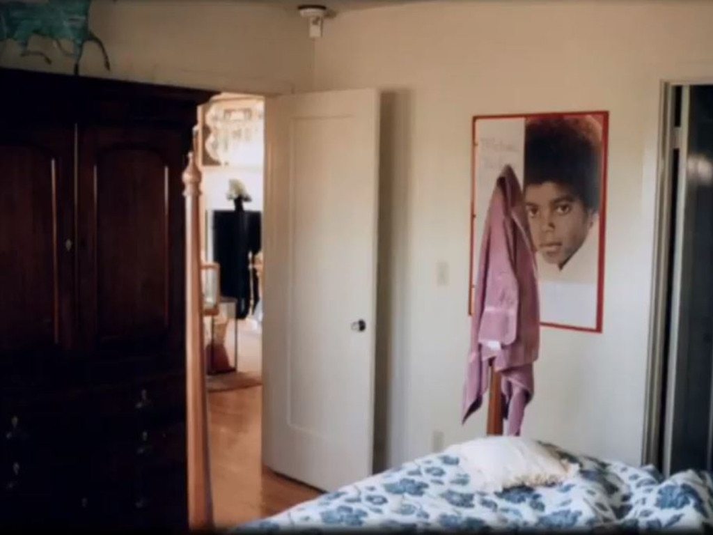 Another bedroom at the ranch featuring portraits of Jackson on the walls. Picture: Leaving Neverland