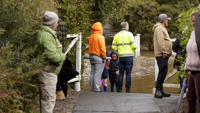People come to look at the flood waters in Latrobe. Picture: Grant Viney