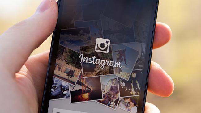 Nizhnevartovsk, Russia - June 12, 2013: Man hand holding iPhone 5 with Instagram App. iPhone is product Apple Inc. Instagram is an online photo-sharing and social networking service. Photo: Istock