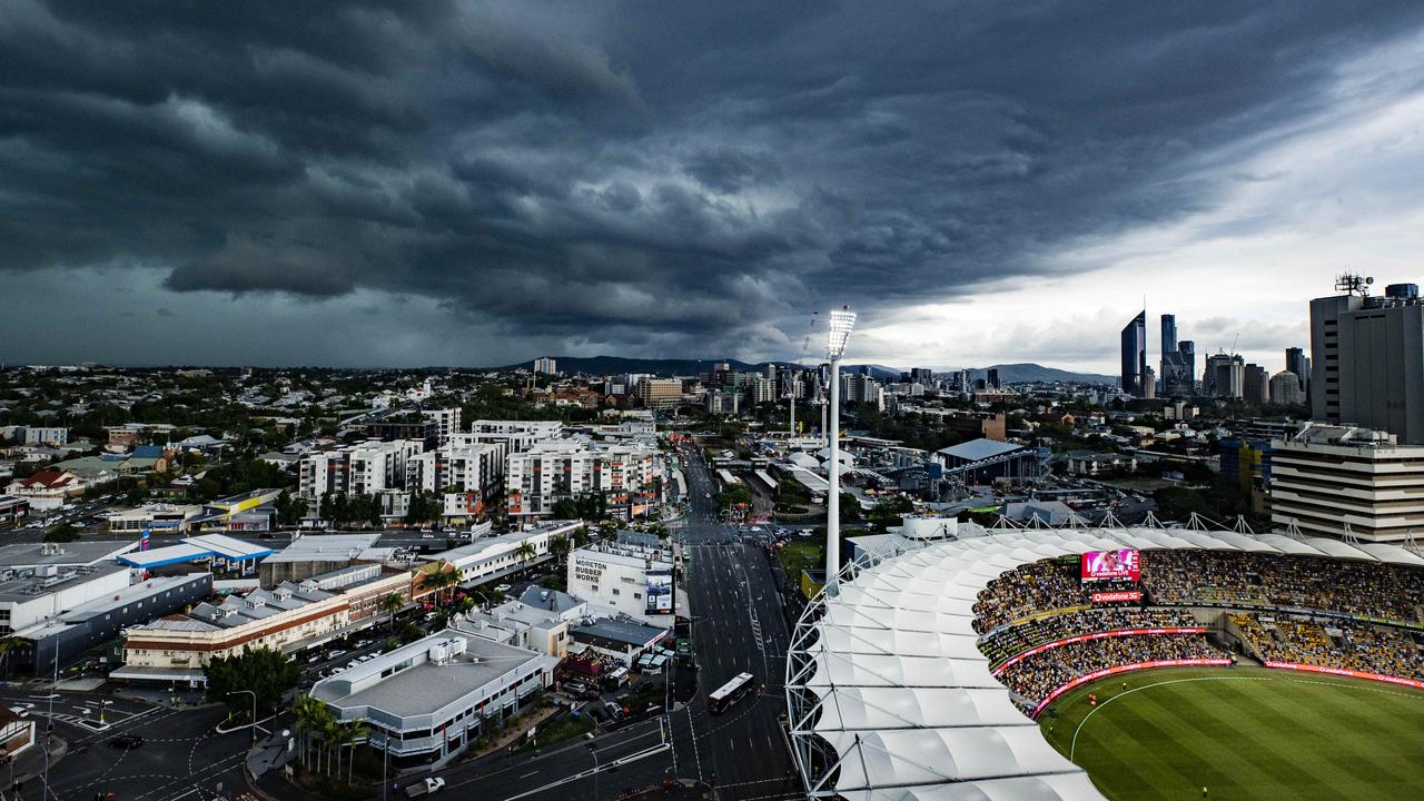 A sttorm approaching the Gabba on day one of the first Ashes test. Picture Lachie Millard