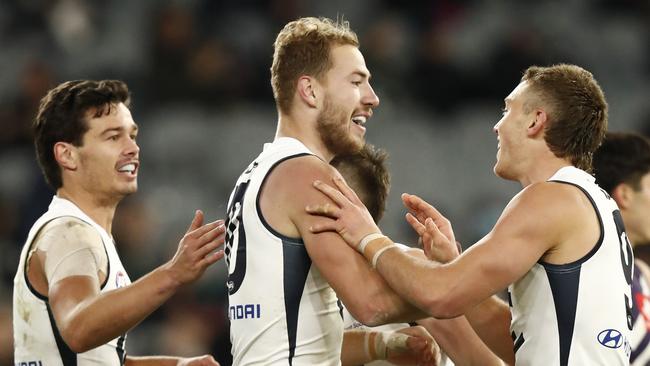 Jack Silvagni (L) and Harry McKay (Centre) kicked five goals between them. (Photo by Darrian Traynor/Getty Images)