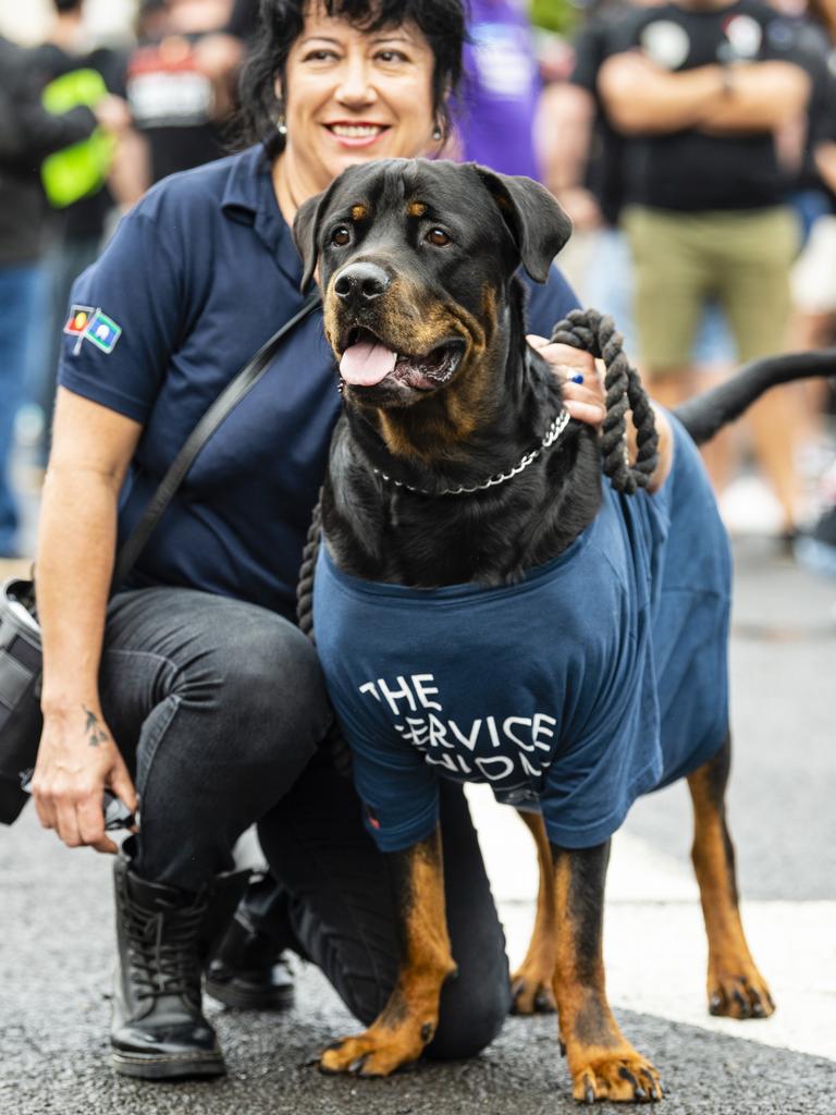 Claudia Reyes and her rottweiler Logan show support for The Services Union at the Labour Day 2022 Toowoomba march, Saturday, April 30, 2022. Picture: Kevin Farmer