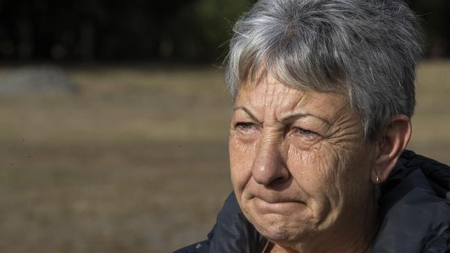 Rosemary Harwood outside Risdon Prison at the vandalised memorial. Picture: Chris Kidd