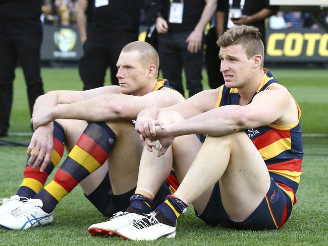 Sam Jacobs and Josh Jenkins watch as the medal presentation. Picture Sarah Reed