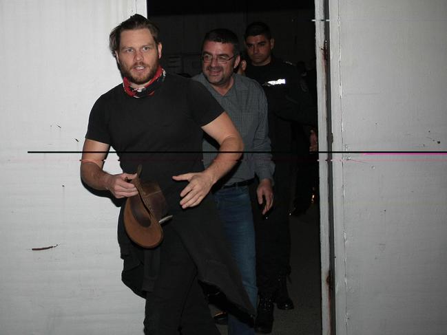 Jock Palfreeman leaves the Busmantsi Detention Centre in front of his lawyer Kalin Angelov. Picture: Supplied