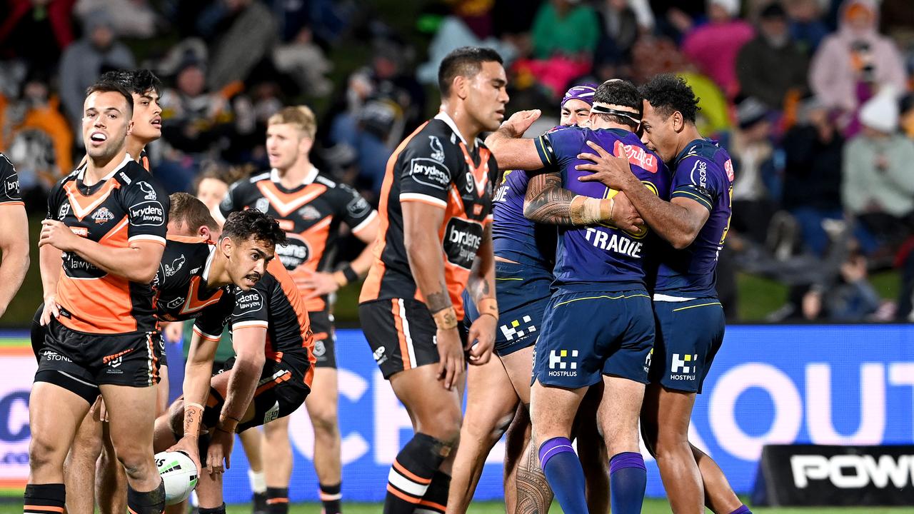 SUNSHINE COAST, AUSTRALIA – JUNE 19: Nelson Asofa-Solomona of the Storm is congratulated by teammates after scoring a try during the round 15 NRL match between the Melbourne Storm and the Wests Tigers at Sunshine Coast Stadium, on June 19, 2021, in Sunshine Coast, Australia. (Photo by Bradley Kanaris/Getty Images)