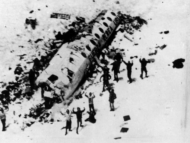 Saved ... Uruguayan rugby union team wave to rescue helicopters near the remains of their plane. Picture: Supplied